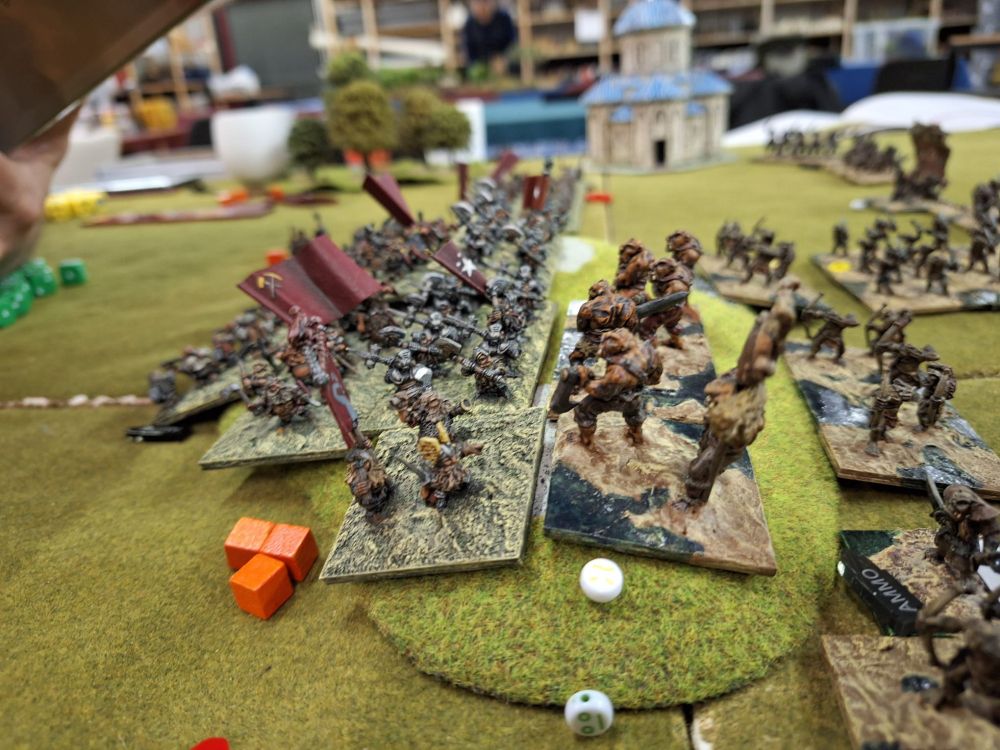 15mm Ogres attacking the Dwarf 3rd Shock regiment on a small hill in the centre of the line.