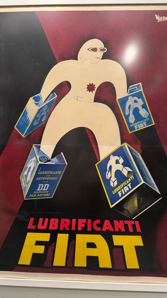 italian poster of a cartoon man with lube cans for feet and hands. it says “lubrificanti fiat”