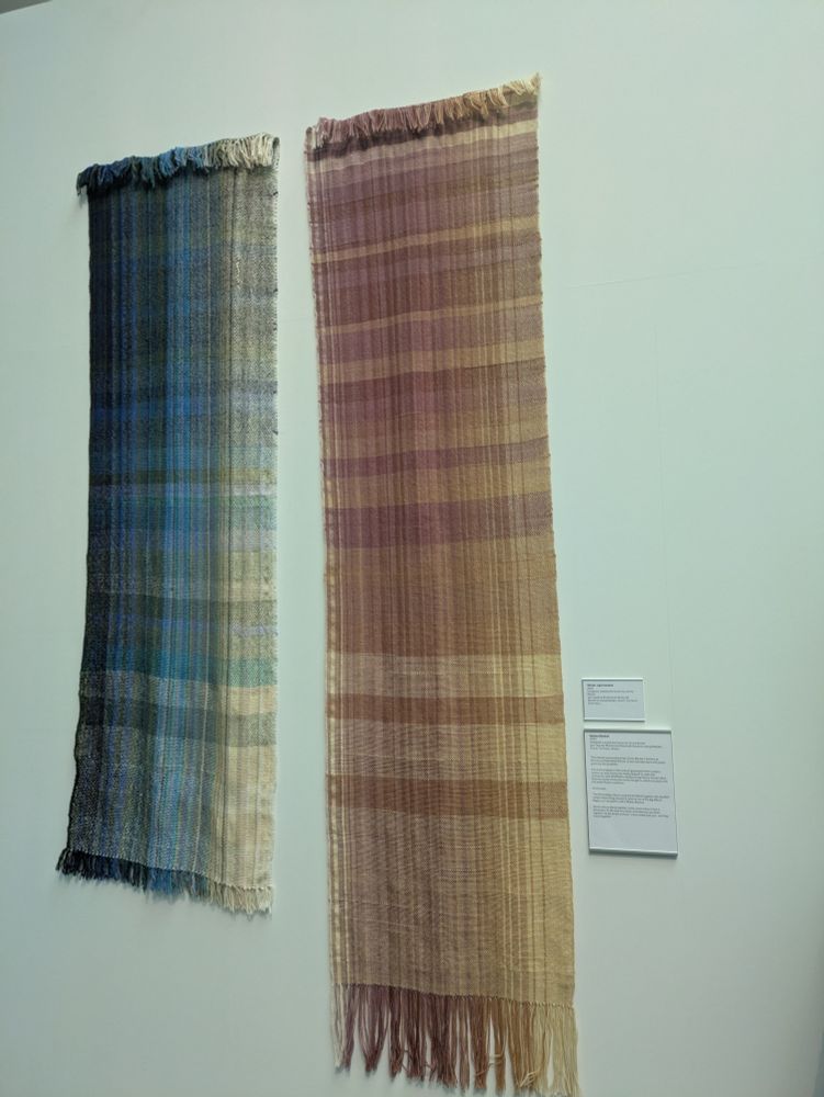 Molten Blanket

2024

Designed, warped and woven by Jimmy Baxter yan dyed by Brantwood Woolcraft Students (using Madder, Cutch, Turmeric, Onion)

This blanket was produced by Jimmy Baxter a student at Brantwood Specialist School. It was naturally dyed with plants grown by the students.

The work is based on the colours generated when metal is heated up, and Jimmy was really pleased to make this connection with Sheffield's metalworking history. He also likes that the purple toned yam looks like gems, which connects with the wider Ruskin collection.

Jimmy says:

The illuminating colours contrast and blend together, like liquefied moiten metal being poured, it reminds me of the Big Melt at Magna, so I decided to call it Molten Blanket

Some colours blend together nicely, some colours have a sharpness, it's like they are sharp, and when you put them together it's Ske sweet and sour a nice sweet and sour-and they mould together