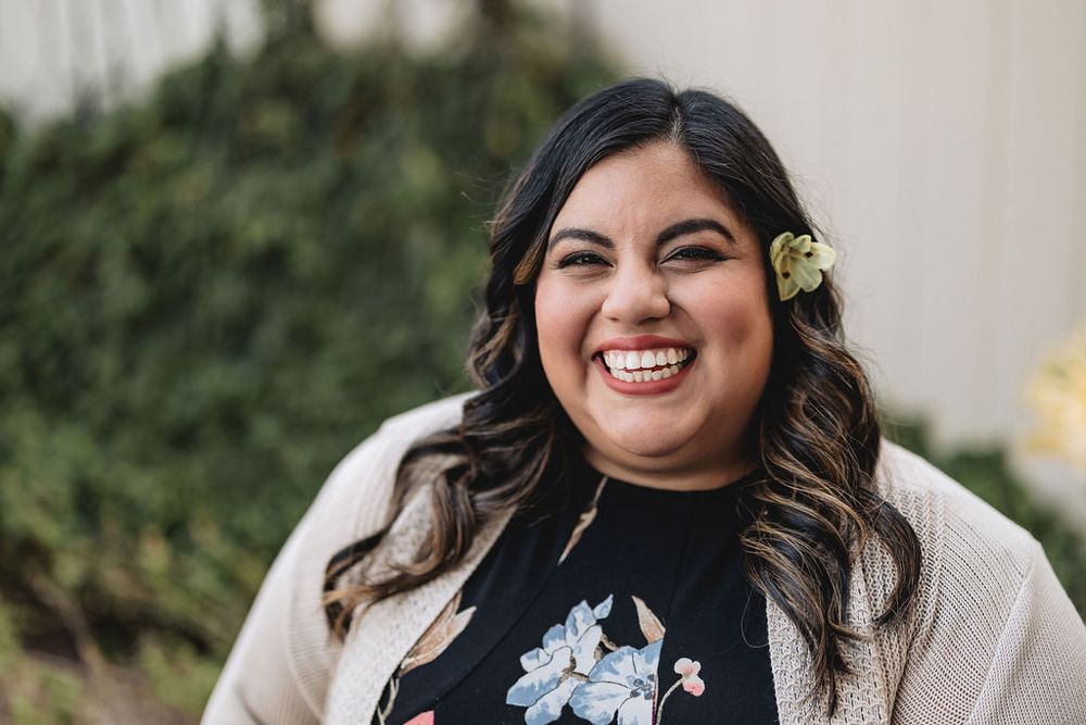 Jennifer van Alstyne, a latina woman, smiling
