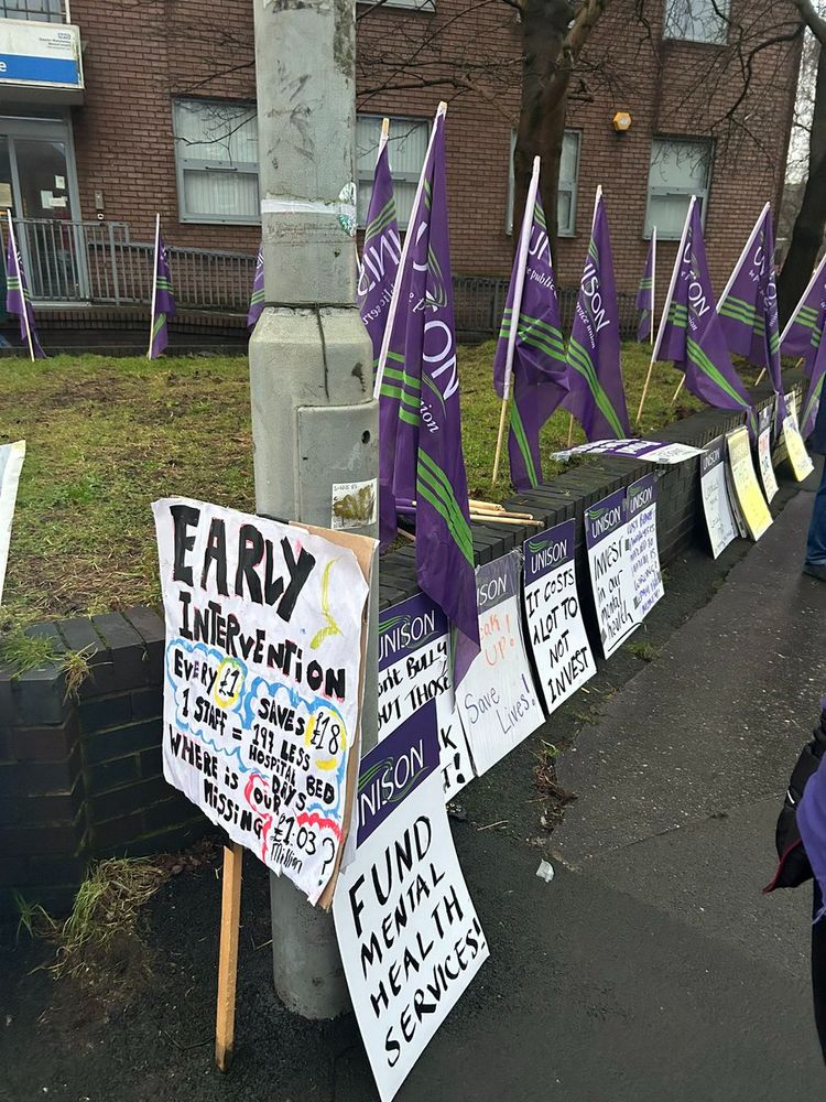Early photo of placards set up at the picket line