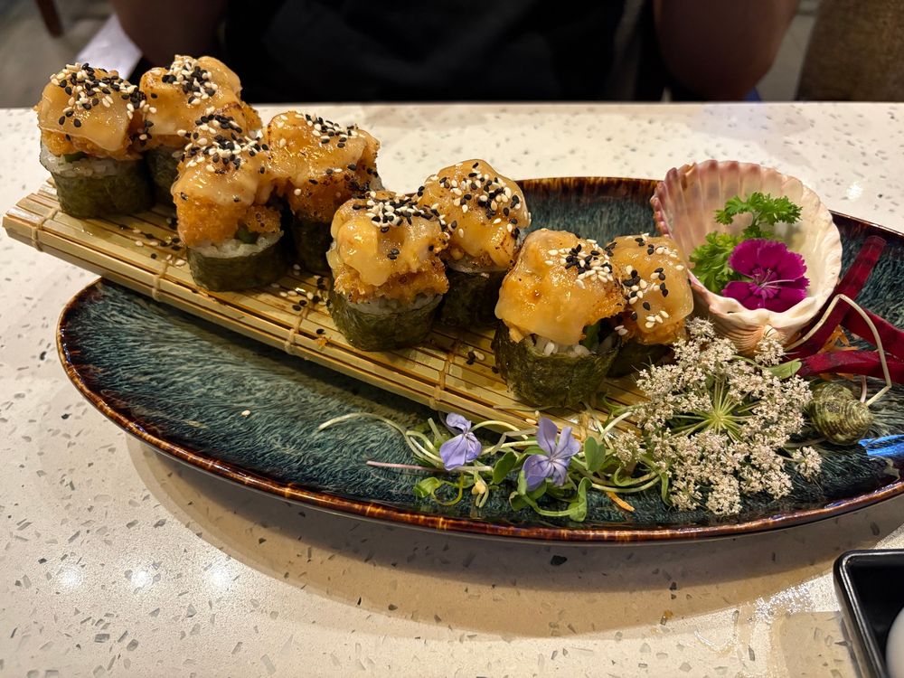Sushi with flower decorations.