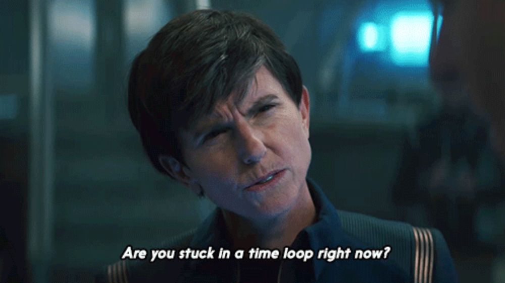 a woman with short hair is asking if she is stuck in a time loop right now