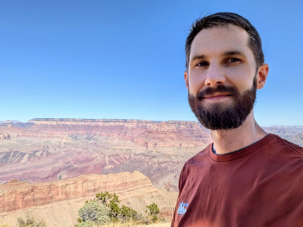 A selfie taken with the Grand Canyon in the background.