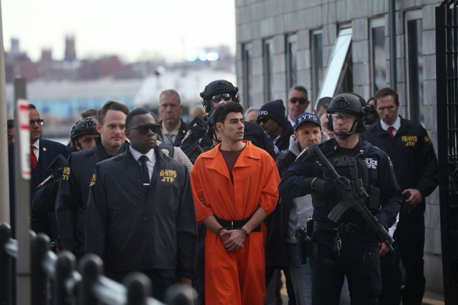 Infamous Luigi perp walk photo 