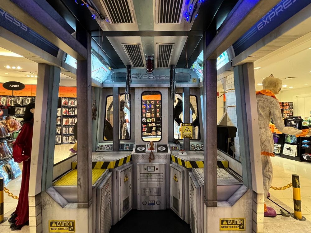 View of the inside of the Spirit Halloween subway car.