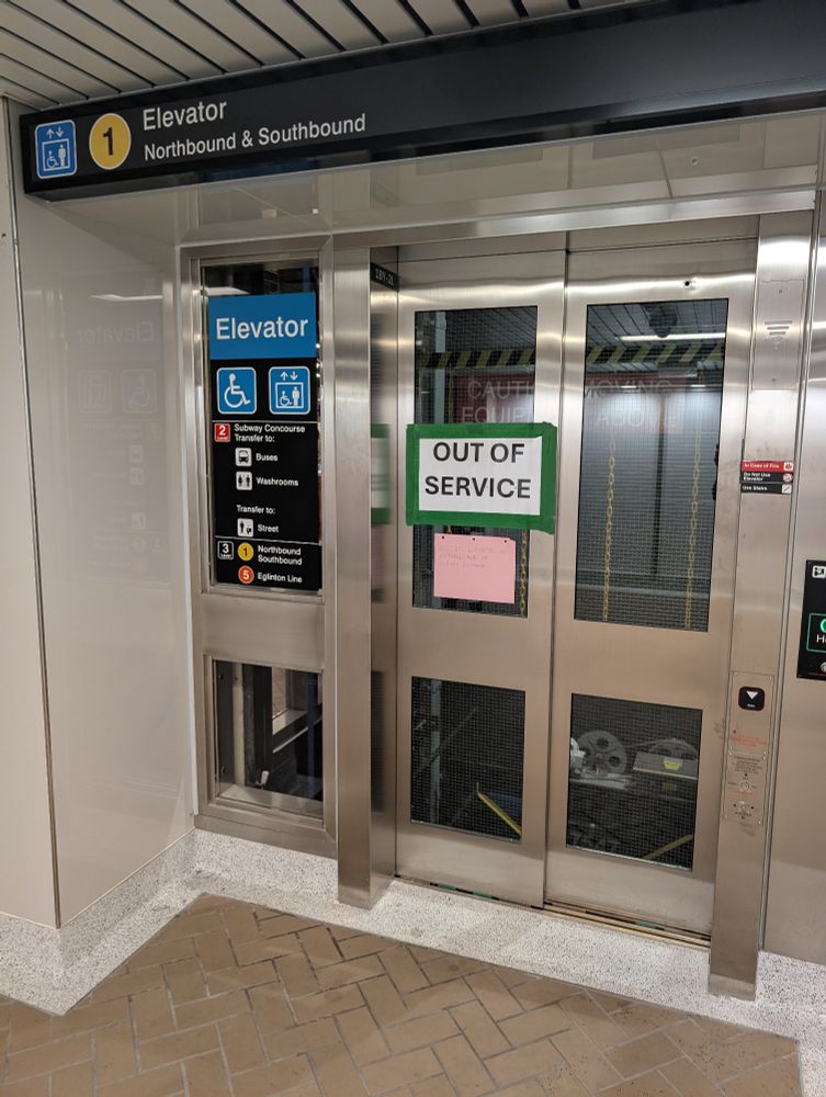 An out-of-service elevator from the concourse level to the Line 1 subway platform