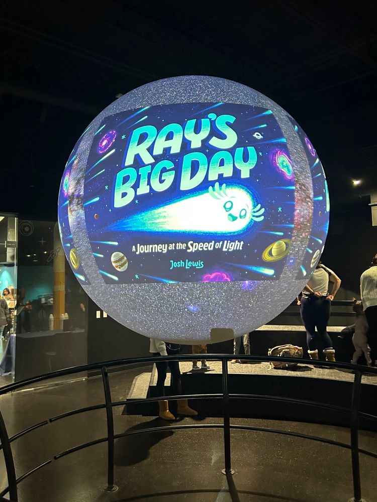 Ray’s Big Day cover projected on the Science on a Sphere at the Space Foundation Discovery Center. 
