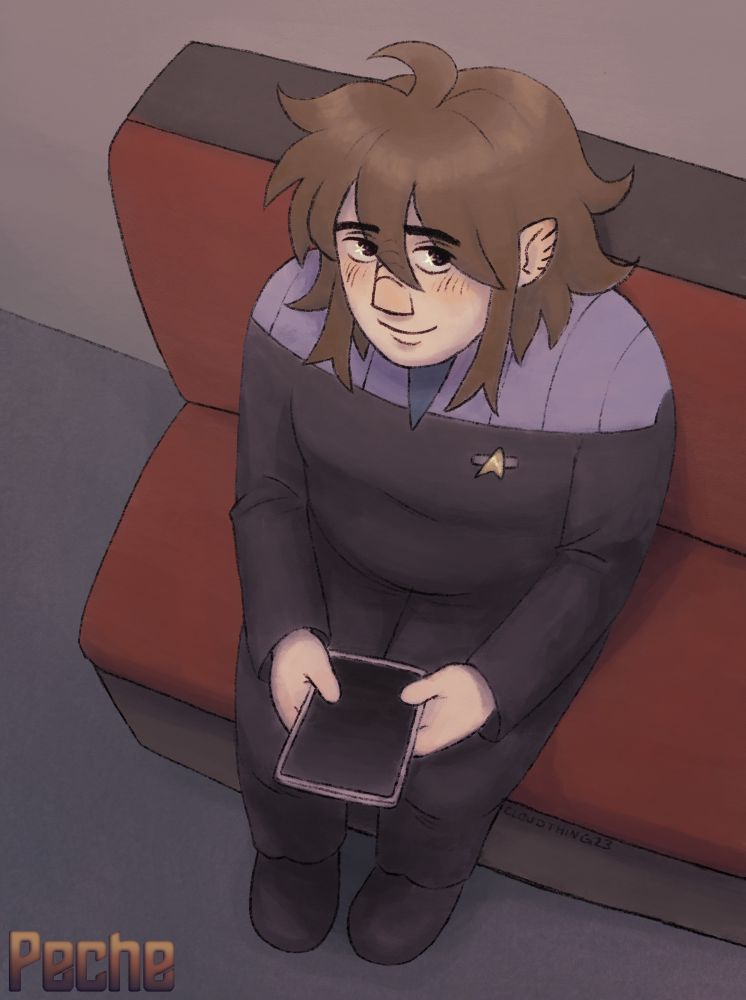 a digital illustration of an original character that belongs to the person I mentioned. Their name is Peche and he’s a half bajoran half betazoid star trek oc! wearing a late deep space 9 uniform. It’s a mostly black jumpsuit with a teal undershirt. he’s sitting on a seat and holding a PADD. which is basically a tablet. They have fluffy light brown hair, a white person’s complexion, and nose and ear ridges.