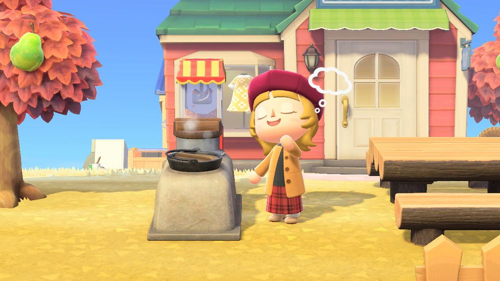 Lilica happy that she placed an outdoor oven near the plaza in front of the Ables’ with a log table and benches.