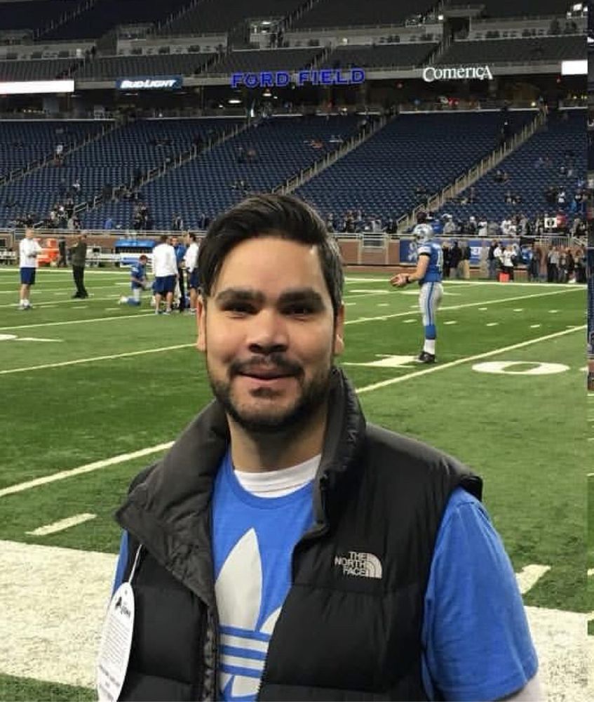 On the field of Ford Field during warm ups 
