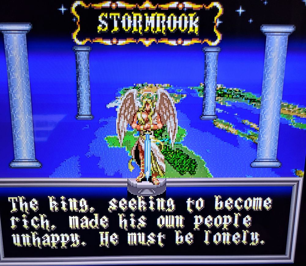 Screenshot from Actraiser 2 video game shows angel with sword talking about a king obsessed with money who made his people unhappy, he must be lonely.