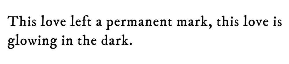 Black text on white background reading: This love left a permanent mark, this love is glowing in the dark.