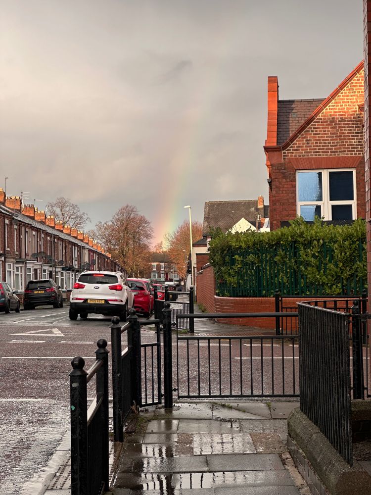 Rainbow over houses