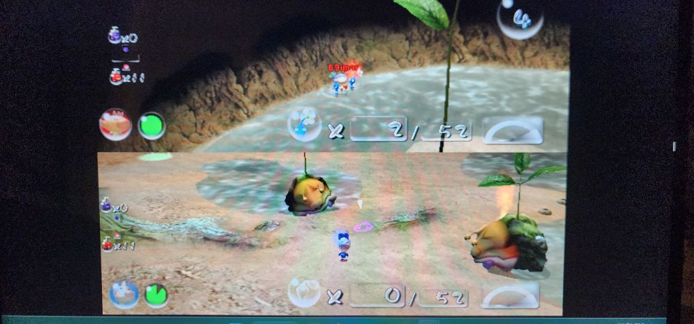 two dead sovereign bulblaxes in a pikmin 2 cave sublevel. they are dead by my hand and my hand alone
