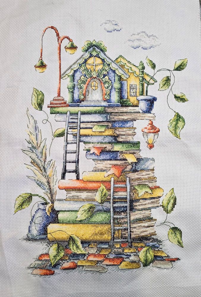 Small hut on stacked books