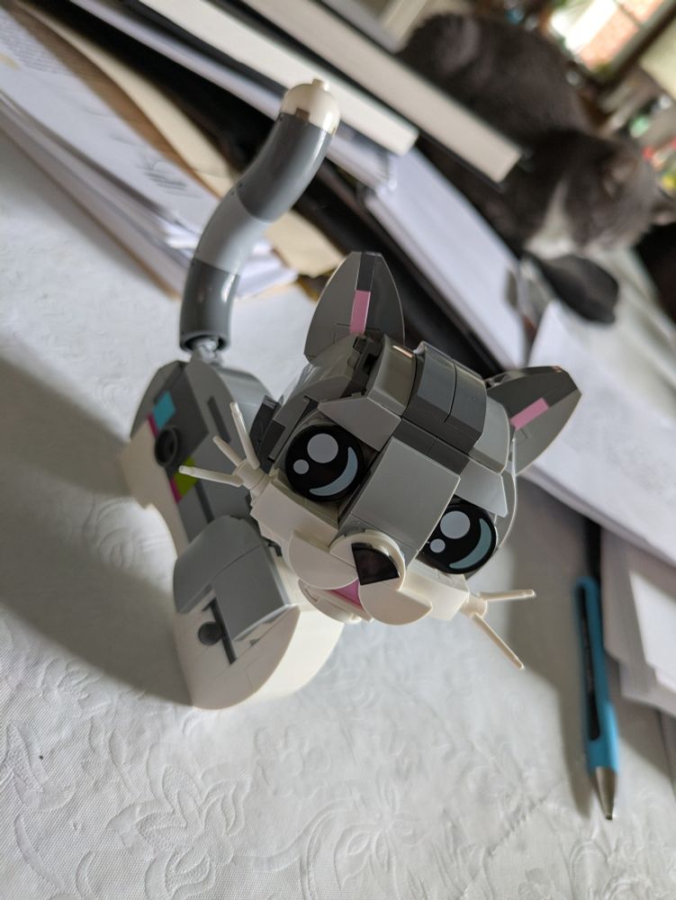 Lego cat body with legs yet to be built 