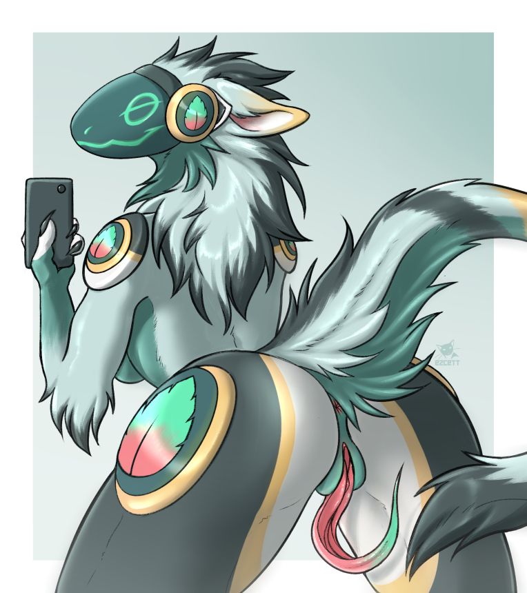 A wintergreen-themed (pale green, a greenish white, black, and gold accents) protogen is presenting her hindquarters to the viewer, showing off her sergal-style genitalia, featuring a long prehensile clitoral hood that curls in an inviting U shape. She is looking back at the viewer with a smile and hooded eyes, holding up a phone to catch their reaction.