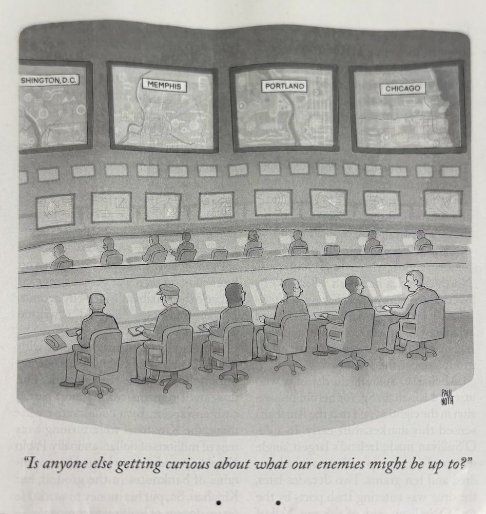 A control room has surveillance screens on Memphis, Portland, Chicago, DC. One worker says, “Is anyone else getting curious about what our enemies might be up to?”