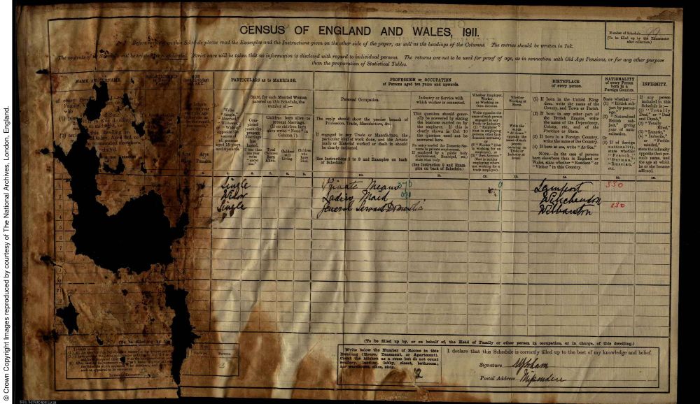 household return from the 1911 census of England and Wales. The names in the left-hand column have been completely obliterated by some sort of water or fire damage. There is a massive hole across the sheet and significant brown discolouration to the page