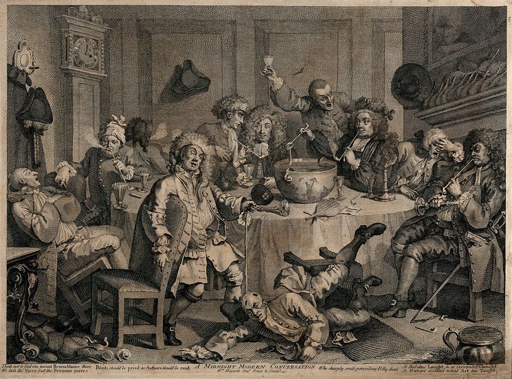 Hogarth engraving of a rowdy party. The scene has a chaotic energy and a number of men are seated around a table in varying states of drunkenness; one man has fallen off his chair and is lying on the floor. Many of the men are smoking pipes and there is a punch bowl and ladle in the middle of the table.