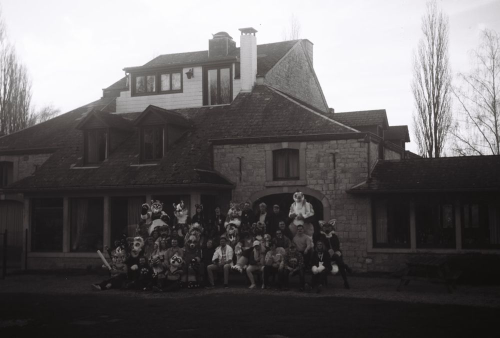 Black and white photo of a furry get together taken on a camera from the 1930's