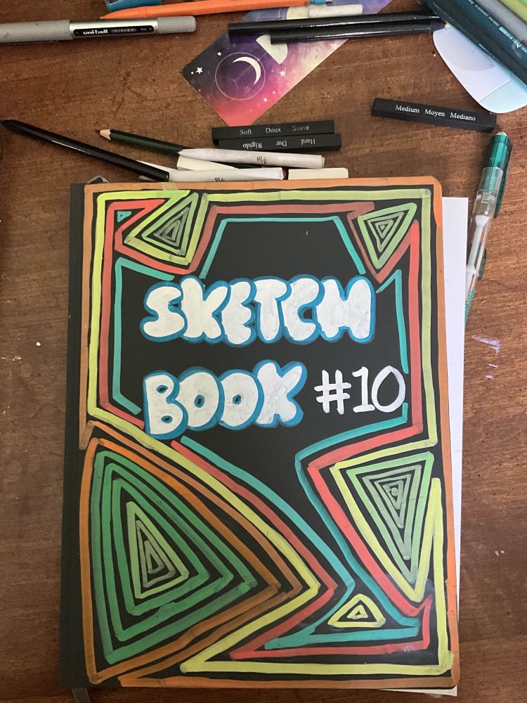My sketchbook decorated in geometric lines, sorta