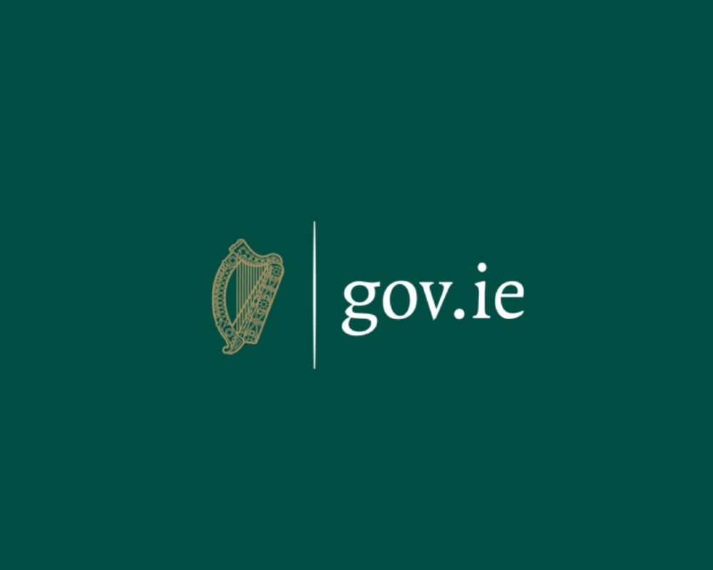 Logo of the Government of Ireland. On the left is a gold harp symbol, and on the right is the text “gov.ie” in white on a dark green background.