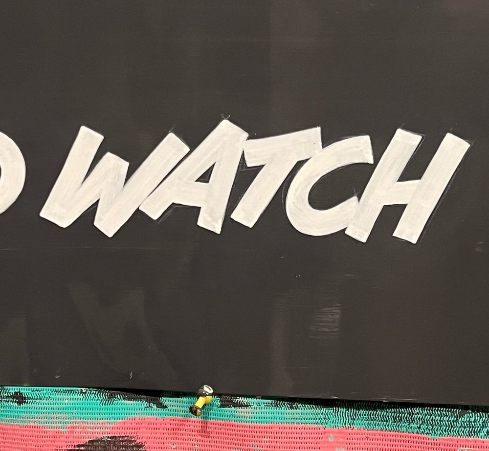 The word WATCH brushed out in enamel. It’s fine, nothing to write home about