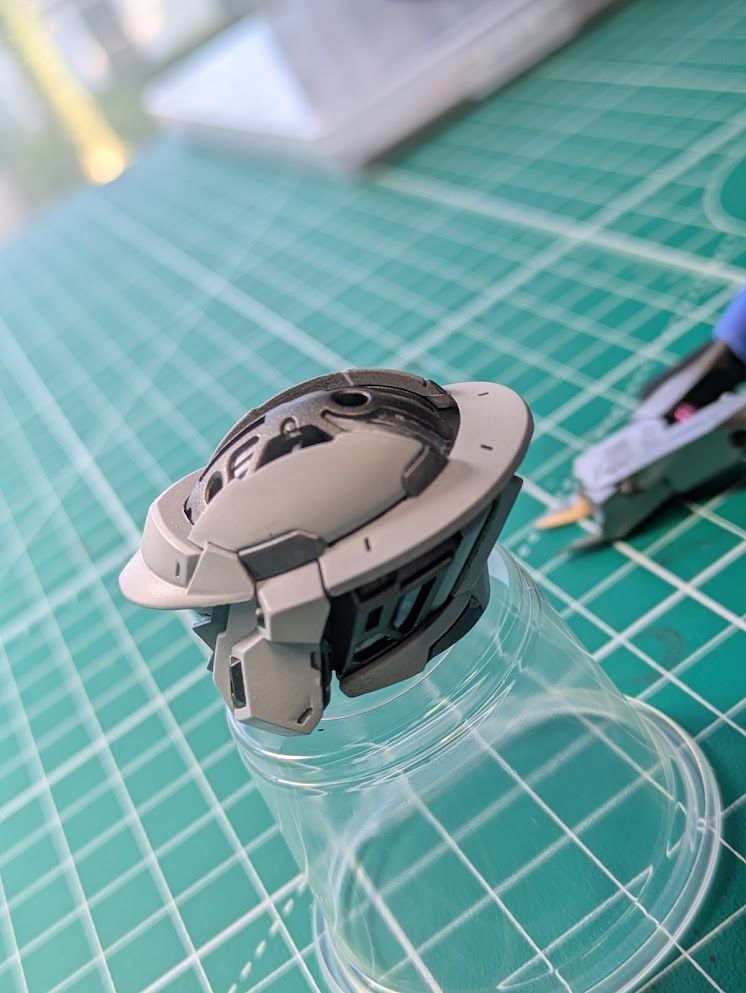 The head from the 1/60 scale Monument [Repair Type] (3rd party Tallgeese) parts of the armor are removed to expose the painted detail on the inner frame.
