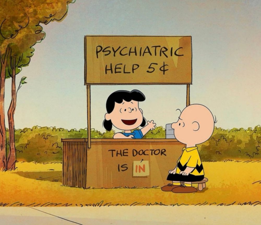 one of les enfants terribles from the charlie brown comic offering unlicensed psychiatric help from her shoddily constructed roadside booth