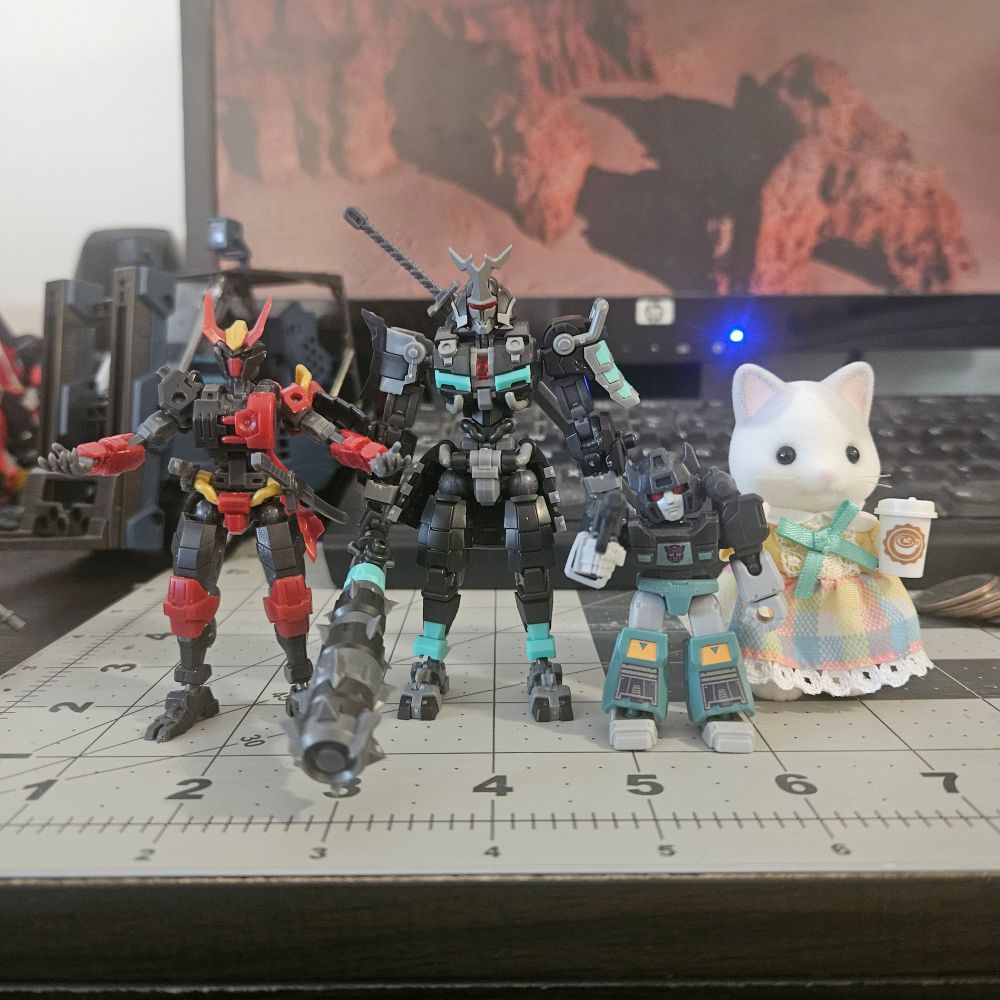 Meijin with Number 57 Armored Puppet Oni Flame, the Latte Cat Calico Critter, and a Blokees Galaxy Defenders SG Sideswipe 