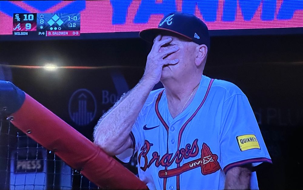 Brian Snitker, head in hand, miserable. The image of the 2025 Braves. 