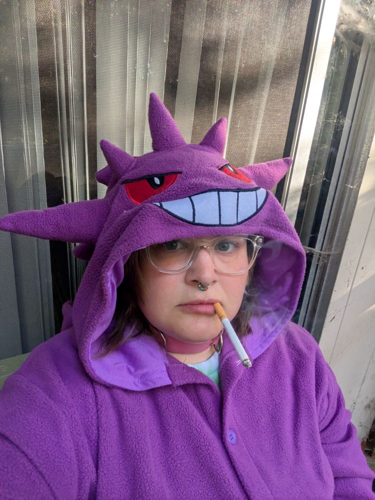 Me dressed as Gengar with a cigarette in my mouth 