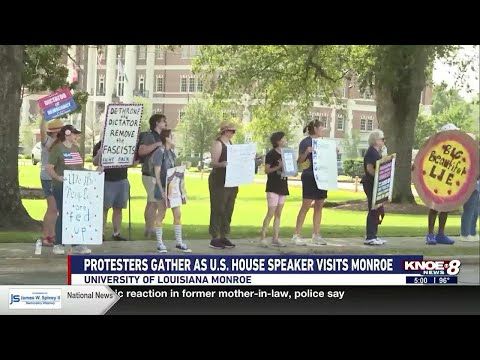 Protestors gathered as U.S. Speaker Mike Johnson visited Monroe