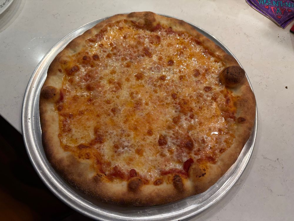 An uncut cheeese pizza. 
