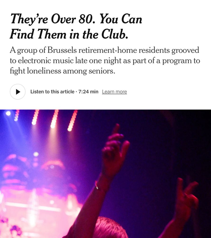 A picture of a person dancing at a nightclub