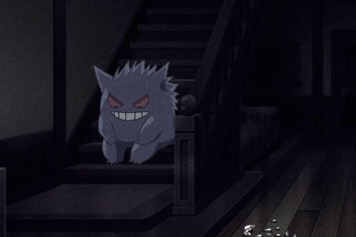 A pokemon, Gengar, sits at the bottom of a staircase looking sad. Broken pieces of a plate are on the floor nearby.