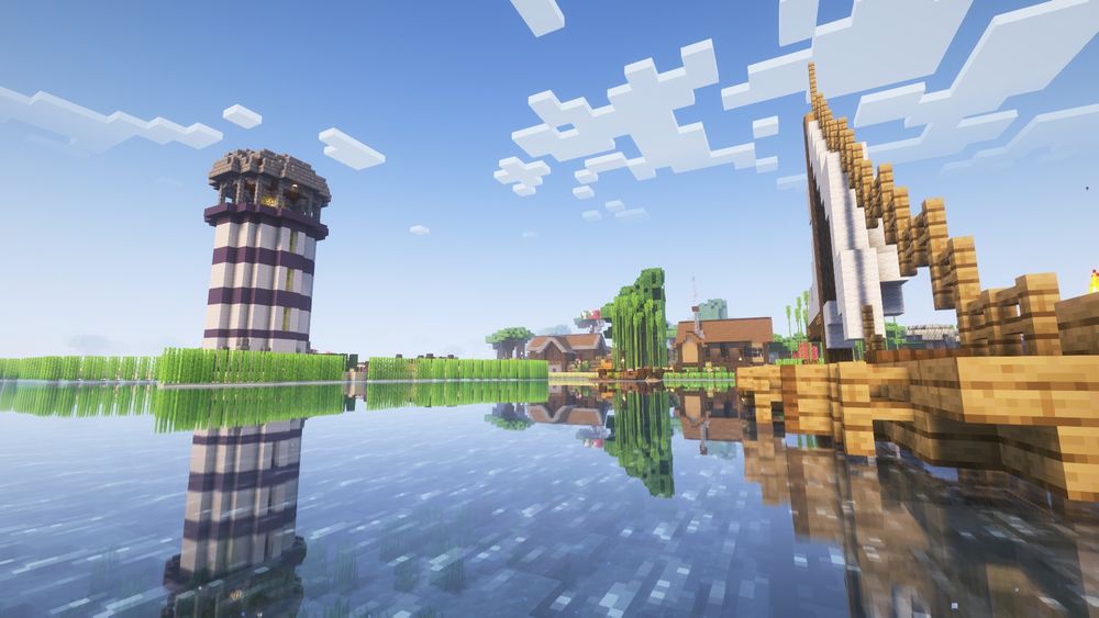 View from the water infront of the boat, lighthouse to the left boat to the right and ahead it the base