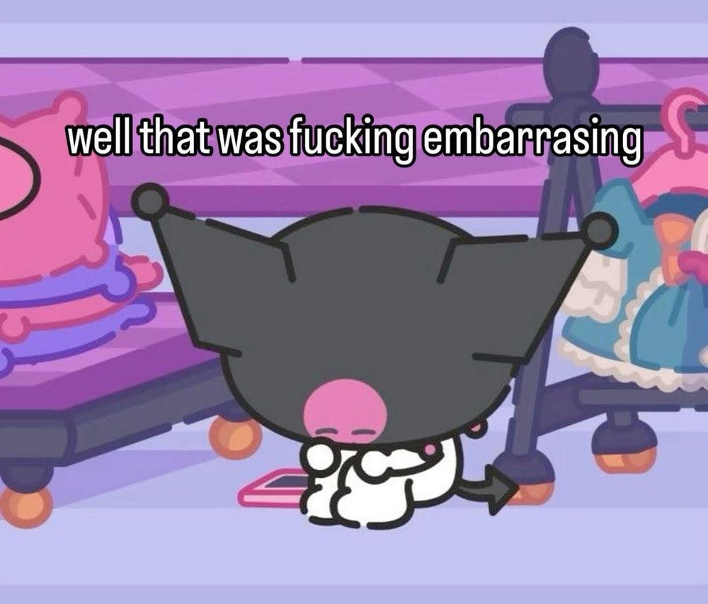 Kuromi sitting on the floor with her head down
