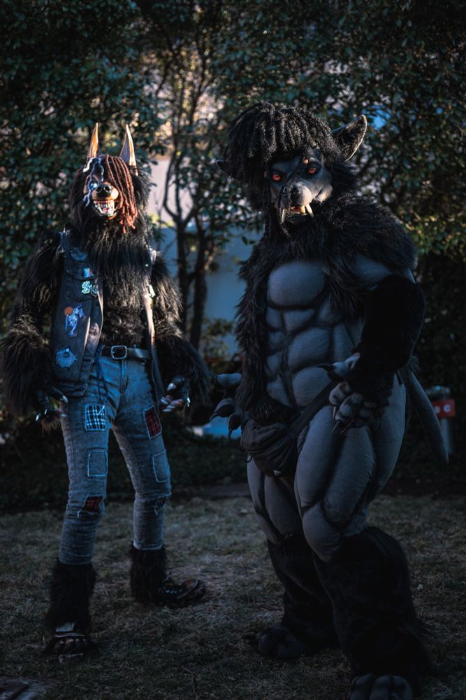 two werewolves standing