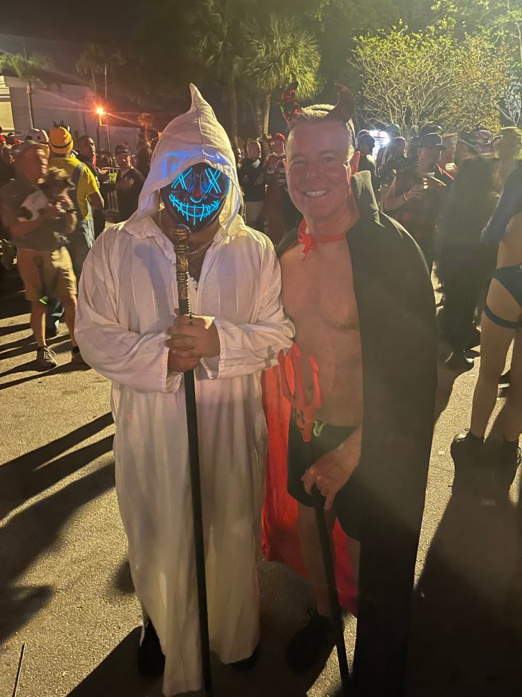 Halloween costumes: man in white robe with mask.  Me as Satan