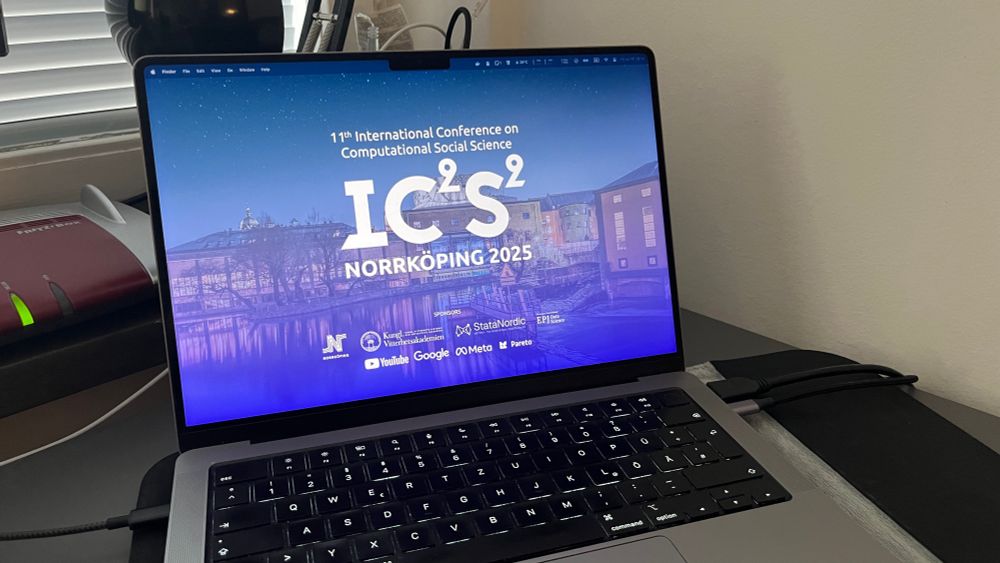 A laptop with an IC2S2 wallpaper