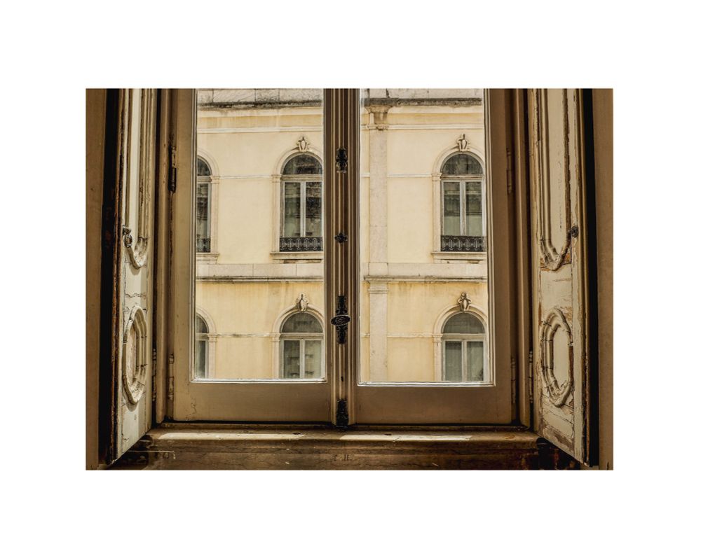 Window in Lisboa 

Soft hues of yellow with sunlight 
 
With Rumi quote 


Your body is away from me
but there is a window open
from my heart to yours.
From this window, like the moon
I keep sending news secretly.

single image by hedy bach 