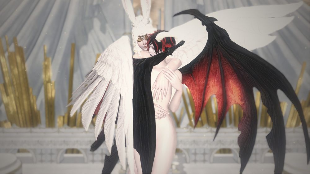 An angelic Madi holding demonic Lynn from behind. Madi, a shapely Viera woman, a humanoid race from Final Fantasy 14 with rabbit ears, on the left has white curly hair with gold highlights done up in a bun with curls down the back of her neck. She has white angel wings, golden glowing eyes, starry golden makeup, golden lipstick, and long white nails. Lynn is a petite woman with white goat horns, black goat ears, and short black and red hair. She has demonic looking wings, similar to a bat's wings. In the background is white marble structures with golden accents. Both nude, Madi with closed eyes and a small smile is hugging Lynn from behind, her left arm over Lynn's shoulder with the hand rest on her breast. Madi's right arm is wrapped around Lynn's waist. Lynn, with eyes closed and a smile, is holding Madi's left arm with her left hand. Madi and Lynn's left wings are outstretched with Madi's right wing wrapping around Lynn's right wing and body.