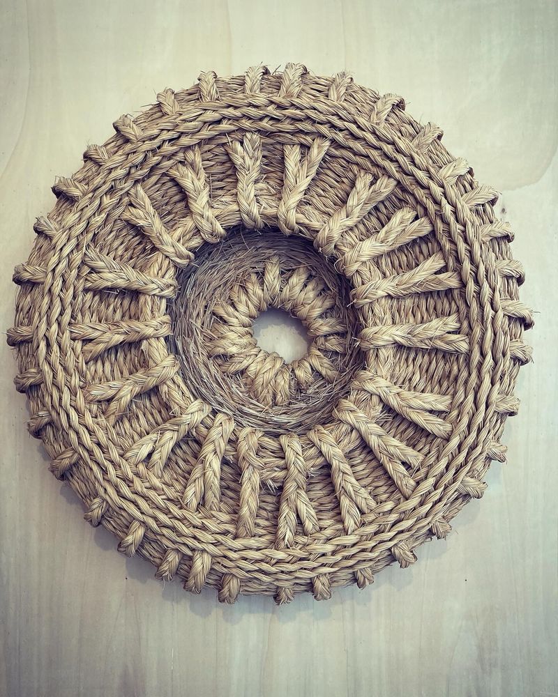 Weaved basketry cushion in geometric patterns 