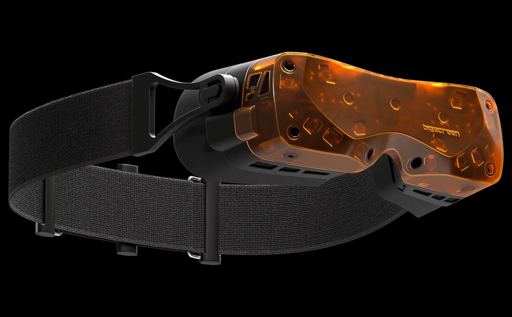 The Bigscreen Beyond 2 VR headset with see-through orange front