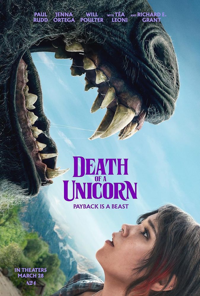Death of a Unicorn movie poster: title and tagline - Payback is a Beast; a young girl is looking frightened looking into the mouth of a unicorn with sharp teeth, a scenery of green trees and mountains is in the background. 