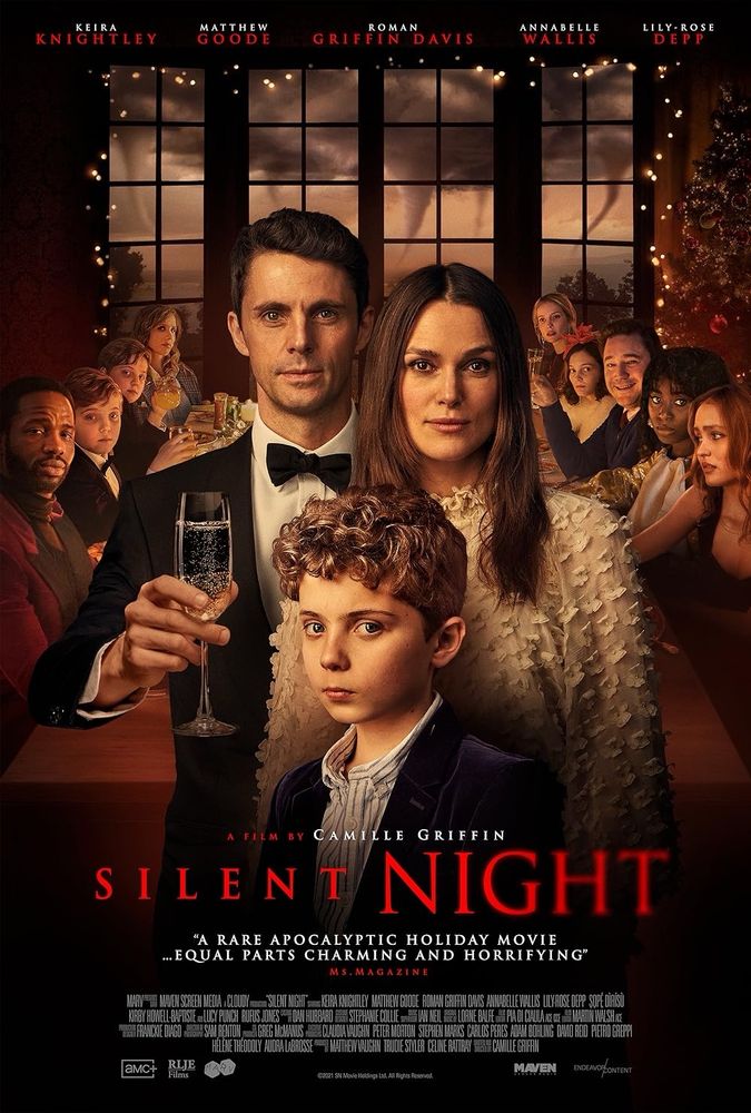 Movie poster for Silent Night; at the forefront is a husband, wife, and child all with dark brown hair. In the background is a table with four people sitting at each side staring at the camera or at one another. 