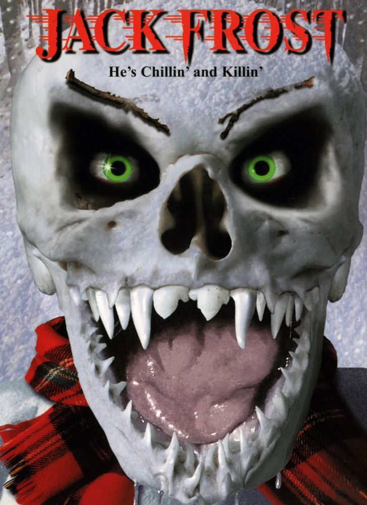 Movie poster for Jack Frost. Close up of a snowman’s face with green eyes and sharp teeth. 
